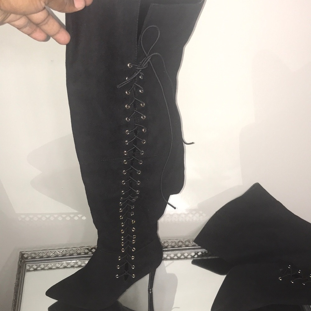 Black thigh high boots